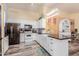 Bright kitchen featuring a farmhouse sink, decorative signs and stainless steel appliances at 8622 W Shaw Butte Dr, Peoria, AZ 85345