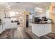 Bright, open kitchen with updated appliances, contrasting floors, and ample counter space at 8622 W Shaw Butte Dr, Peoria, AZ 85345