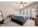 Bright main bedroom featuring a vaulted ceiling, lots of natural light, and carpeted floors at 8622 W Shaw Butte Dr, Peoria, AZ 85345