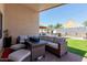 Inviting outdoor patio features comfortable seating, perfect for entertaining guests and enjoying the backyard at 8622 W Shaw Butte Dr, Peoria, AZ 85345