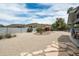 Expansive backyard showcasing mature landscaping, gravel and mountain views at 9039 N Concho Ln, Phoenix, AZ 85028