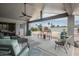 Comfortable patio area featuring a large yard and desert landscaping at 9039 N Concho Ln, Phoenix, AZ 85028