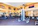 Spacious community gym featuring a variety of equipment and ceiling fans at 10030 W Indian School Rd # 215, Phoenix, AZ 85037