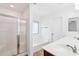 Bright bathroom featuring double sinks, a walk-in shower, and a soaking tub at 11158 N 162Nd Dr, Surprise, AZ 85379
