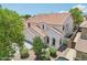 Attractive two-story home showcasing a tidy front yard with desert landscaping, a two-car garage and nice curb appeal at 11158 N 162Nd Dr, Surprise, AZ 85379