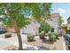 Beautiful two-story home with a well-kept front yard, desert landscaping, and a spacious two-car garage at 11158 N 162Nd Dr, Surprise, AZ 85379