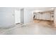 Spacious garage featuring painted grey walls and room for at least two vehicles at 11158 N 162Nd Dr, Surprise, AZ 85379