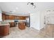 Kitchen featuring stainless steel appliances, central island and wood cabinetry at 11158 N 162Nd Dr, Surprise, AZ 85379