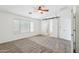 Spacious and bright main bedroom with barn door access to en-suite at 11158 N 162Nd Dr, Surprise, AZ 85379