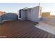 Spacious rooftop deck with modern decking material and partial pergola and mountain view at 120 W Milada Dr, Phoenix, AZ 85041