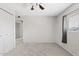 Bedroom with carpet, a ceiling fan, closet, and a window for natural light at 12201 N 22Nd Pl, Phoenix, AZ 85022