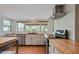 Modern kitchen with stainless steel appliances and butcher block countertops at 13019 N 23Rd Pl, Phoenix, AZ 85022