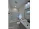 Bathroom featuring a shower-tub combo, granite counters, and modern fixtures at 14860 S Capistrano Rd, Arizona City, AZ 85123