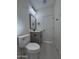 Bathroom featuring modern fixtures, a toilet, and a vanity at 14860 S Capistrano Rd, Arizona City, AZ 85123