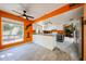 Bright kitchen with granite counters, white cabinets, modern appliances and wood-look tile at 1500 N Markdale -- # 68, Mesa, AZ 85201