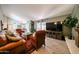 Open living area with tile flooring, fireplace, and comfortable seating at 1500 N Markdale -- # 68, Mesa, AZ 85201