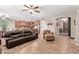 Open floor plan connects the living room with the kitchen and features tile flooring at 157 W Leatherwood Ave, San Tan Valley, AZ 85140