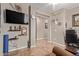 Comfortable home office with tile flooring, custom wall decor, and lots of natural light at 157 W Leatherwood Ave, San Tan Valley, AZ 85140