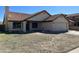 Charming single-story home with desert landscaping, tile roof, and an attached garage at 15801 W Meade Ln, Goodyear, AZ 85338