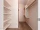 Walk-in closet with shelving and hanging racks for optimal storage at 16450 E Avenue Of The Fountain Ave # 11, Fountain Hills, AZ 85268