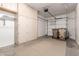 Spacious garage with ample storage cabinets and access to garage door at 16450 E Avenue Of The Fountain Ave # 11, Fountain Hills, AZ 85268