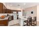 Well-equipped kitchen with stainless steel appliances, center island, and ample cabinet space at 16450 E Avenue Of The Fountain Ave # 11, Fountain Hills, AZ 85268