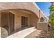 Outdoor patio with privacy wall, concrete floor, and desert landscaping at 16450 E Avenue Of The Fountain Ave # 11, Fountain Hills, AZ 85268