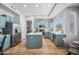 Bright kitchen featuring blue cabinets, stainless appliances, a center island and light countertops at 16608 S 16Th Ave, Phoenix, AZ 85045
