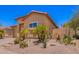 Lovely home with desert landscaping and a flag in a well-maintained neighborhood at 1702 W Amberwood Dr, Phoenix, AZ 85045