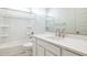 Bright bathroom featuring a shower-tub combination and a vanity with stainless steel fixtures at 17743 W Onyx Ave, Waddell, AZ 85355
