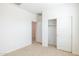Bedroom with closet space provides ample storage and organization solutions at 17743 W Onyx Ave, Waddell, AZ 85355