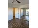 Spacious bedroom featuring hard wood flooring and a mirrored closet door at 1800 W Elliot Rd # 107, Chandler, AZ 85224