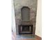 Fireplace with stylish gray stone surround and hearth, adding character to the home at 1800 W Elliot Rd # 107, Chandler, AZ 85224