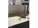 Private outdoor patio with concrete flooring and walled perimeter, providing a secluded area for relaxation at 1800 W Elliot Rd # 107, Chandler, AZ 85224