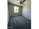 Bright bedroom featuring a large window that floods the room with natural light and plush carpeting at 1835 E Burgess Ln, Phoenix, AZ 85042