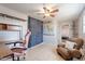 Versatile bedroom or office space with modern furniture and a cozy atmosphere at 2103 N Silverton St, Mesa, AZ 85203