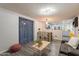 Stylish living room connected to the dining area, showcasing modern flooring and bright, open space at 2103 N Silverton St, Mesa, AZ 85203