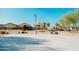 Outdoor basketball court with a hoop and view to the neighborhood homes at 2130 N Cypress Point N Way, Casa Grande, AZ 85122