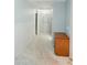 Hallway with neutral carpet, fresh paint, and a charming decor at 2130 N Cypress Point N Way, Casa Grande, AZ 85122