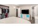 Relaxing bedroom with a view to the ensuite bathroom, and a tidy closet at 2210 E Birchwood Ave, Mesa, AZ 85204