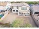 Aerial view showcasing backyard, covered patio, and proximity to neighboring pools in a serene community at 2336 W Laredo Ln, Phoenix, AZ 85085