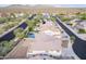 Aerial view of the house showcasing the tile roof, large backyard, and neighborhood layout at 2336 W Laredo Ln, Phoenix, AZ 85085