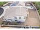 Aerial view of a single-Gathering home with a pool, solar panels, and a patio area in a residential neighborhood at 2336 W Laredo Ln, Phoenix, AZ 85085