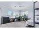 Bedroom with desk, large windows offering natural light at 2336 W Laredo Ln, Phoenix, AZ 85085