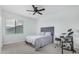 Bedroom featuring a window and a ceiling fan at 2336 W Laredo Ln, Phoenix, AZ 85085