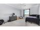 Bright bedroom with a large window and ceiling fan at 2336 W Laredo Ln, Phoenix, AZ 85085