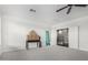 Bonus room with neutral carpet, a ceiling fan, and ample space for recreation or storage at 2336 W Laredo Ln, Phoenix, AZ 85085