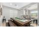 Well lit dining room offers rustic wood table, bench seats, and simple decor at 2336 W Laredo Ln, Phoenix, AZ 85085