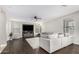 Spacious living room features modern decor, a large TV, and ample natural light at 2336 W Laredo Ln, Phoenix, AZ 85085