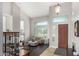 Bright living room with large windows, vaulted ceilings and neutral color palette at 2336 W Laredo Ln, Phoenix, AZ 85085